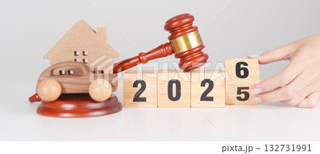 Happy New Year 2026 with house and Car model and gavel justice hammer on desk in courthouse. Real Estate and Car Law, Home Insurance, property Tax, Auction and Bidding concepts 132731991