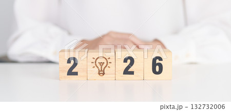 2026 year block with lightbulb. Business Idea, Creative, Thinking, brainstorm, Goal, Resolution, strategy, plan, Action, change and New Year start concepts 132732006
