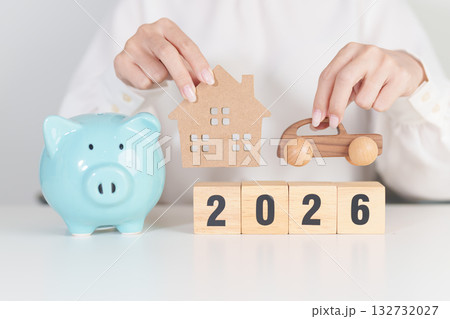 Happy New Year 2026 with car and Home model with coin stack. Car loan, Interest rate, real estate, house, Insurance, Financial, Repair, Tax, mortgage and Maintenance Happy New Year 2026 with car and Home model with coin stack. Car loan, Interest rate, real estate, house, Insurance, Financial, Repair, Tax, mortgage and Maintenance 132732027