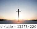 Rising New Year sunrise and the Holy Cross of Jesus Christ, with bright sky and shining sun in the background 132734220