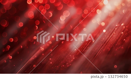 Glimmering crimson particles and slanting light rays generating vibrant, celebratory atmosphere with dynamic visual energy and sparkling festive backdrop 132734650