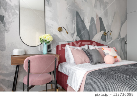 Modern Bedroom with Pink Chair and Elegant Decor Modern Bedroom with Pink Chair and Elegant Decor 132736089