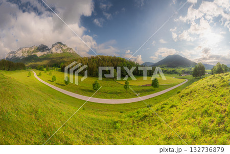 Meadow with road and bench during sunset in Berchtesgaden National Park 132736879