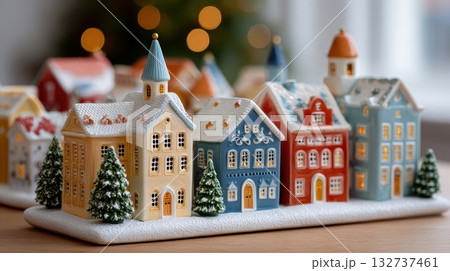 Charming miniature ceramic Christmas village with festive lights 132737461