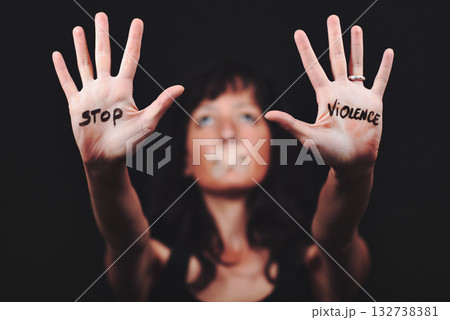 Woman with open hands saying stop violence Woman with open hands saying stop violence 132738381