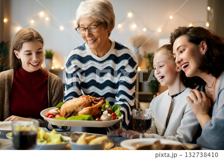 Family celebrating Thanksgiving Day Family celebrating Thanksgiving Day 132738410