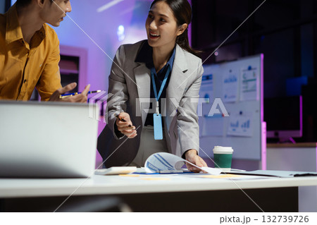 project manager working overtime on startup planning, updating progress milestones, and collaborating with investors for business success. project manager working overtime on startup planning, updating progress milestones, and collaborating with investors for business success. 132739726