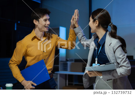Happy creative business people are motivated, giving high five and celebration successful deal. Cooperation Meeting Partnership Career growth Team building Successful business. 132739732