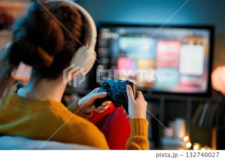 woman is playing video game woman is playing video game 132740027