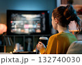 woman watching TV at home 132740030