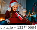 girl with Christmas gift 132740094