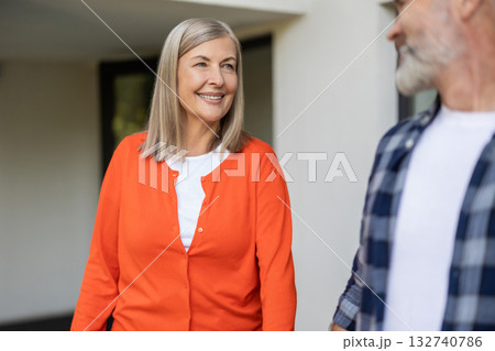 Happy mature couple feeling positive and relaxed together Happy mature couple feeling positive and relaxed together 132740786