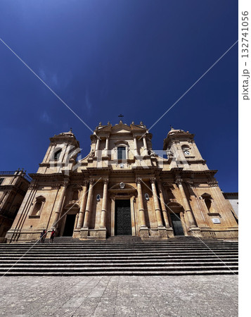 Majestic Baroque Cathedral Under Clear Blue Sky 132741056