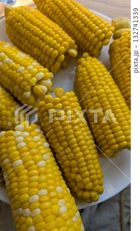 Delicious and Freshly Cooked Corn on the Cob, Perfect for Any Meal or Celebration Occasion Delicious and Freshly Cooked Corn on the Cob, Perfect for Any Meal or Celebration Occasion 132741339