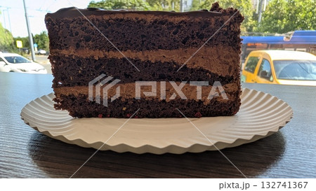 Indulge yourself with a decadent slice of rich Chocolate Layer Cake thats simply divine 132741367