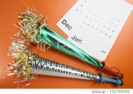 Calendar showing 1st January 2026 as the new year with party horns. Happy New Year concept or Celebration 132744591