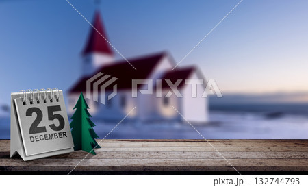 Green paper Christmas tree with a calendar showing 25 December on a wooden table with a church background. Holiday greetings or winter themes. Concept of the Merry Christmas celebration 132744793