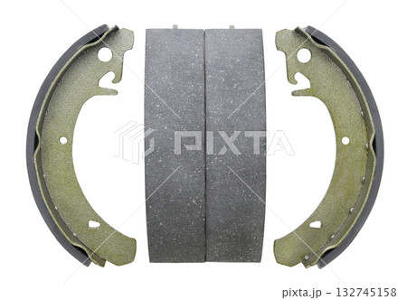 Brake pads drums cut out on a white. Top view 132745158