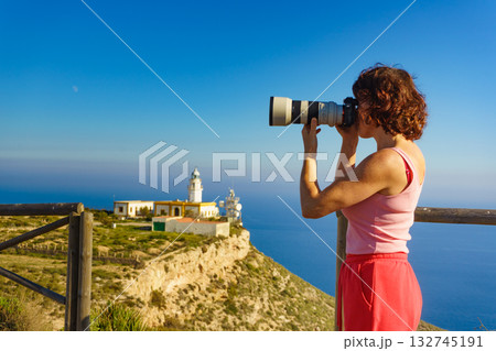 Tourist take photo at lighthouse, Cabo de Gata, Spain Tourist take photo at lighthouse, Cabo de Gata, Spain 132745191