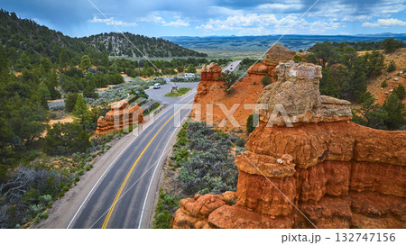 Aerial Red Canyon Hoodoo Formations and Scenic Road in Utah Forest 132747156