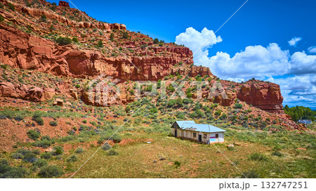 Aerial Desert Cliffs and Abandoned House in Kanab Utah Aerial Desert Cliffs and Abandoned House in Kanab Utah 132747251