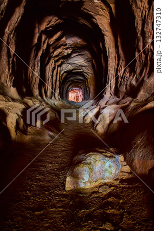Belly of the Dragon Cave Tunnel Interior with Textured Rock Walls and Boulder Belly of the Dragon Cave Tunnel Interior with Textured Rock Walls and Boulder 132747310