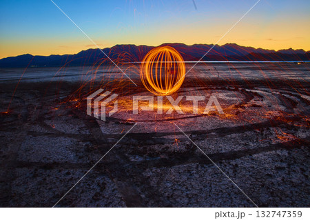 Steel Wool Light Painting on Boulder City Dry Lake Bed at Golden Hour Steel Wool Light Painting on Boulder City Dry Lake Bed at Golden Hour 132747359
