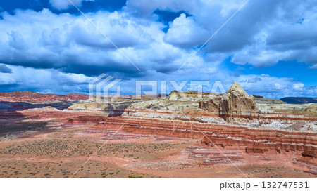 Aerial Desert Cliffs and Mesas with Pyramid Formation Catstair Canyon Utah 132747531
