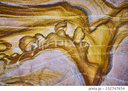 Abstract Golden Sand Texture with Blue and White Streaks Close Up Abstract Golden Sand Texture with Blue and White Streaks Close Up 132747654