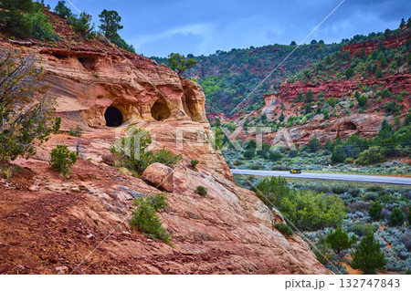 Sandstone Caves and Red Rock Cliffs with Desert Highway Kanab Utah 132747843