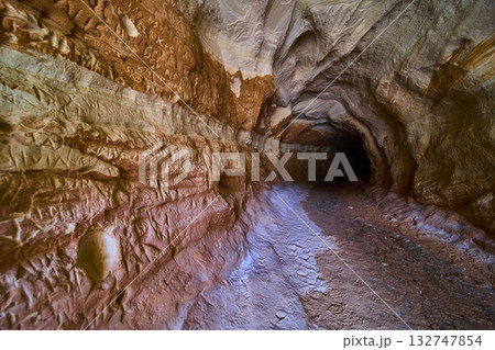 Sandstone Cave Interior with Carved Walls and Graffiti Kanab Utah Trail Entrance 132747854