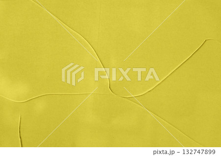 Minimal yellow glass texture with soft intersecting lines forming smooth geometric shapes across surface. Natural background for modern design, creative layout and visual branding 132747899