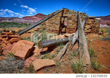 Abandoned Stone Cabin Ruins in Paria Township Utah Desert with Red Rock Mesas 132748030