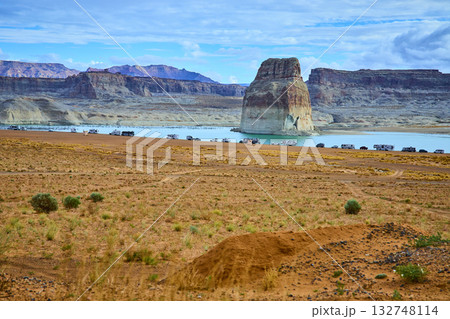Lone Rock Desert Landscape with RV Campers and Lake Powell in Utah Lone Rock Desert Landscape with RV Campers and Lake Powell in Utah 132748114