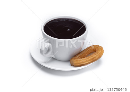 Spanish churros with hot thick chocolate in a white cup Spanish churros with hot thick chocolate in a white cup 132750446