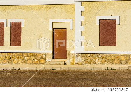 Details of yellow facade wall building 132751847