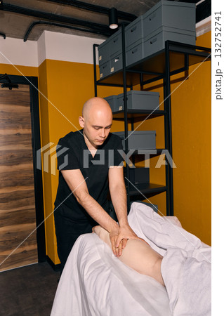 Enjoy a Professional Massage Therapy Session in our Contemporary Studio for relaxation 132752741