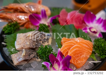 Sashimi set with vegetable served in a restaurant 132753202