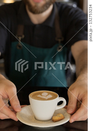 Barista serving latte coffee 132753234