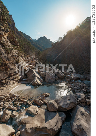 Rocky valley and frozen stream at sunrise in Seoraksan National Park, Sokcho 132753552