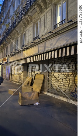 Abandoned Cardboard Boxes on Graffiti Wall Street Scene Abandoned Cardboard Boxes on Graffiti Wall Street Scene 132753680