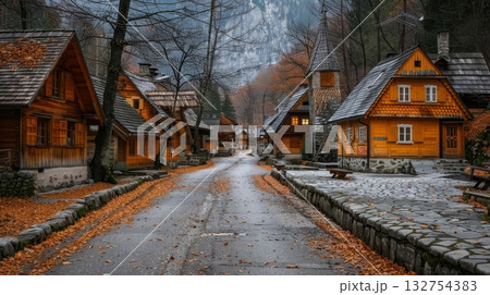 Charming austrian mountain village with traditional wooden homes nestled in scenic nature 132754383