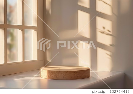 Abstract shadow of a round wooden tabletop cast on a white wall for product mockup presentation Abstract shadow of a round wooden tabletop cast on a white wall for product mockup presentation 132754415