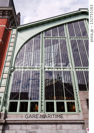 Solar panels integrated into windows on facade of the Gare Maritime former railway station on the Tour and Taxis site in Brussels, Belgium 132755163