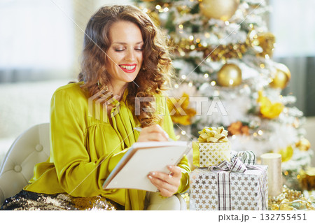 Woman Reflects on Holiday Plans with Eyes Closed Woman Reflects on Holiday Plans with Eyes Closed 132755451