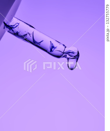 A pipette with serum demonstrating its juicy texture on a purple background. A pipette with serum demonstrating its juicy texture on a purple background. 132755779