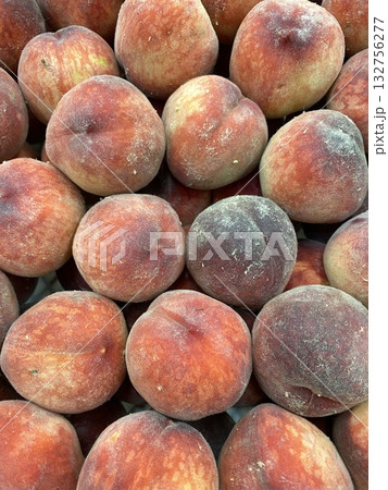 Peaches in a close-up view showcasing fresh fruit texture and color 132756277