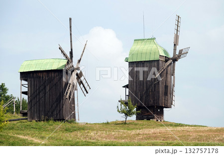 Kyiv, Ukraine, September 1, 2025: Ancient mills in the open-air museum of folk architecture and everyday life of Ukraine Kyiv, Ukraine, September 1, 2025: Ancient mills in the open-air museum of folk architecture and everyday life of Ukraine 132757178