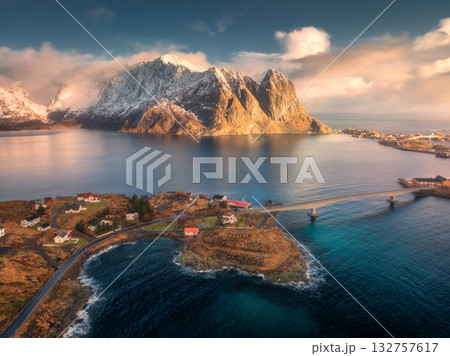 Aerial view of Reine village, fjords and snowy mountains 132757617
