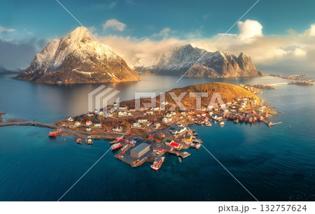 Aerial view of Reine village, fjords and snowy mountains 132757624